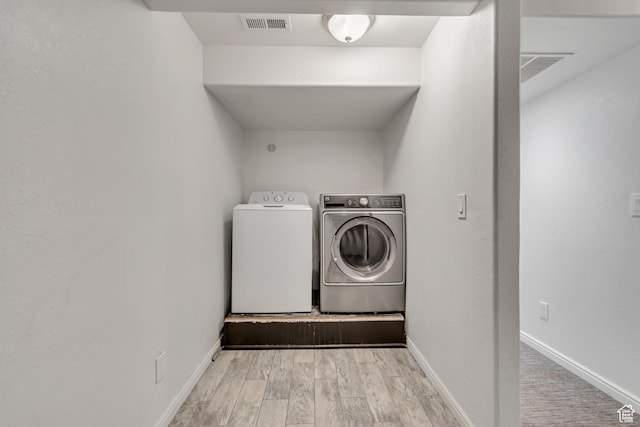 327 E 2260 S, Heber City, UT 84032 - laundry room featuring independent washer and dryer and wood finished floors