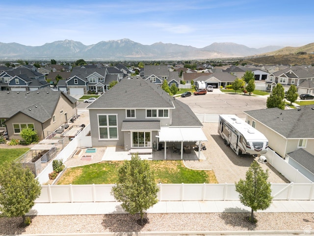 13698 S Black Hoof Cir, Herriman, UT 84096 - back of house featuring a residential view, a fenced backyard, a patio area, and stucco siding