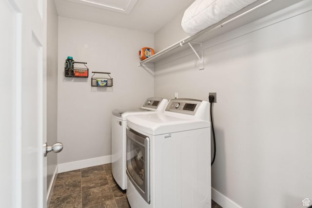 13698 S Black Hoof Cir, Herriman, UT 84096 - laundry area featuring independent washer and dryer and dark stone finish flooring
