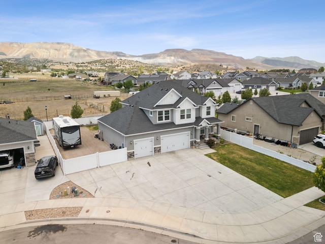 13698 S Black Hoof Cir, Herriman, UT 84096 - aerial perspective of suburban area with a mountain backdrop