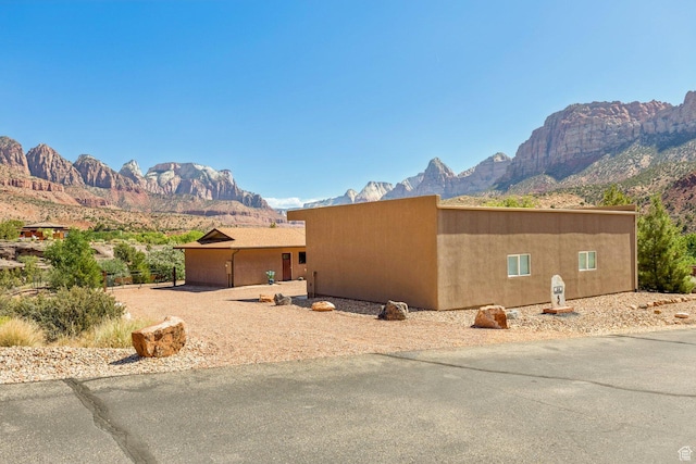 34 Valley View Dr, Springdale, UT 84767 - view of side of home with a mountain view