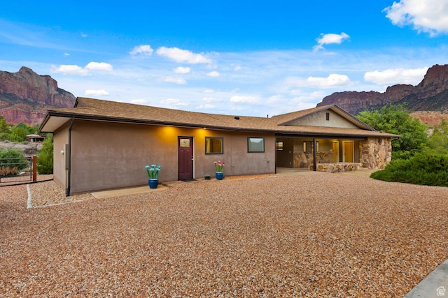 34 Valley View Dr, Springdale, UT 84767 - ranch-style house with a mountain view, stucco siding, and a patio