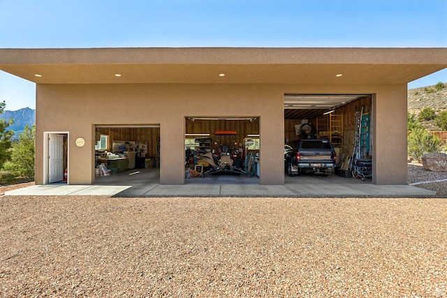 34 Valley View Dr, Springdale, UT 84767 - garage featuring a mountain view and driveway