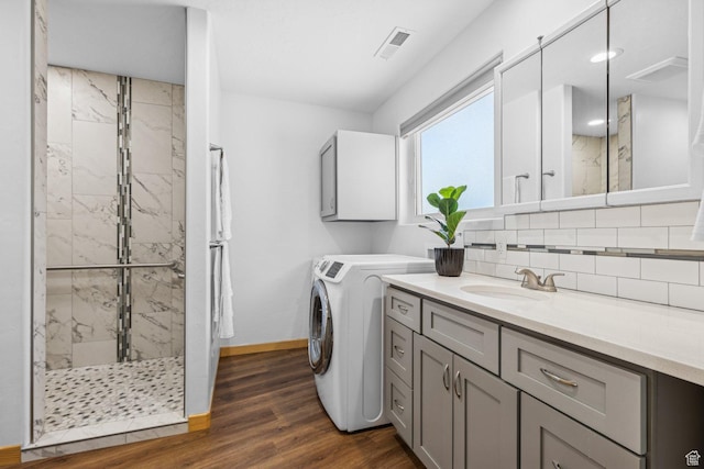 34 Valley View Dr, Springdale, UT 84767 - laundry area with dark wood-type flooring and washer / dryer