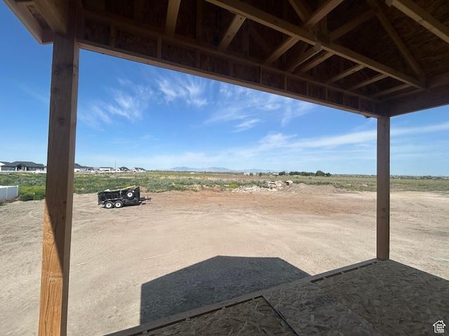 3191 S 5100 W Unit 1, Hooper, UT 84315 - view of patio / terrace with a mountain view and a view of countryside