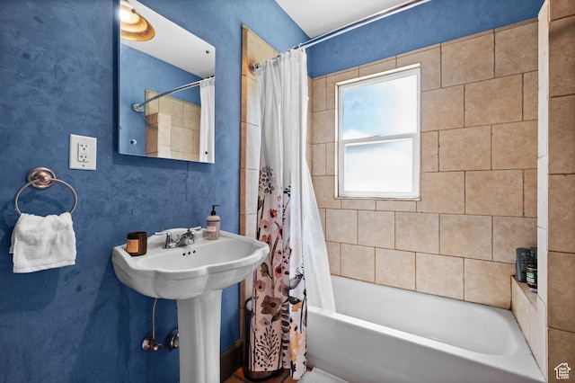 832 E Ramona Ave, Salt Lake City, UT 84105 - bathroom featuring shower / bath combination with curtain and a sink