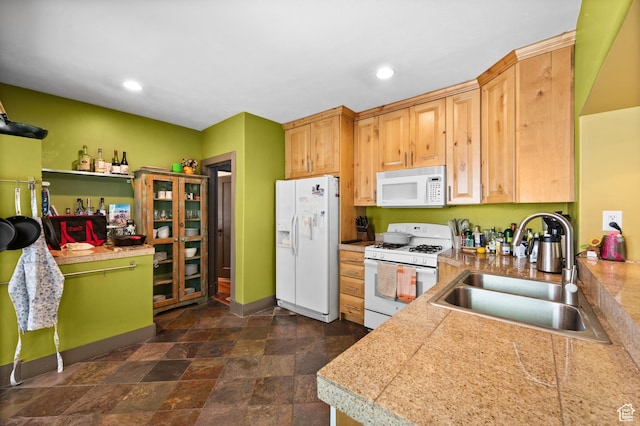 832 E Ramona Ave, Salt Lake City, UT 84105 - kitchen with white appliances, tile counters, dark stone finish flooring, and recessed lighting
