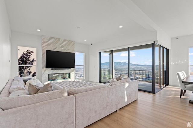 4473 N Solstice Dr, Lehi, UT 84043 - living area featuring light wood-type flooring and recessed lighting