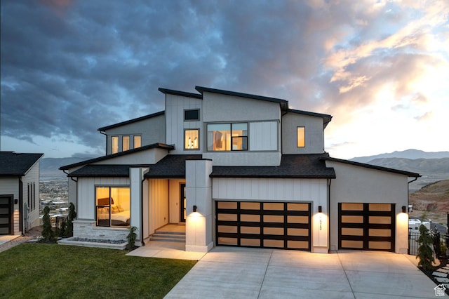 4473 N Solstice Dr, Lehi, UT 84043 - modern home featuring a mountain view, concrete driveway, a garage, and a shingled roof