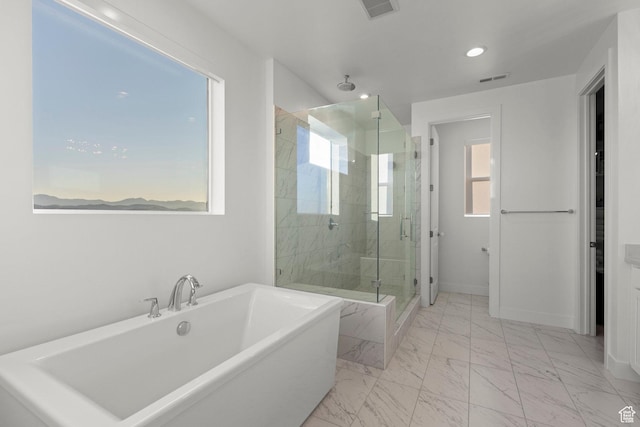 4473 N Solstice Dr, Lehi, UT 84043 - bathroom with a freestanding bath, a shower stall, marble look tile flooring, and recessed lighting