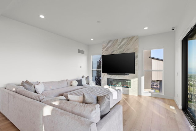4473 N Solstice Dr, Lehi, UT 84043 - living area with light wood-style floors and recessed lighting