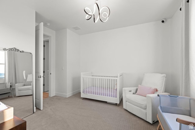 4473 N Solstice Dr, Lehi, UT 84043 - carpeted bedroom featuring a chandelier and a crib
