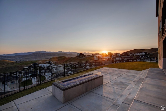 4473 N Solstice Dr, Lehi, UT 84043 - view of patio with an outdoor fire pit and a mountain view