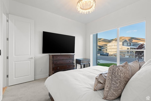 4473 N Solstice Dr, Lehi, UT 84043 - bedroom featuring a chandelier, carpet floors, and access to exterior