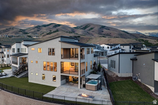4473 N Solstice Dr, Lehi, UT 84043 - rear view of house featuring a balcony, stairs, and a fenced backyard