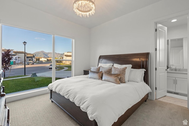 4473 N Solstice Dr, Lehi, UT 84043 - bedroom featuring a chandelier, a residential view, light carpet, connected bathroom, and a mountain view