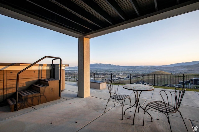 4473 N Solstice Dr, Lehi, UT 84043 - patio terrace at dusk with a mountain view and a patio area