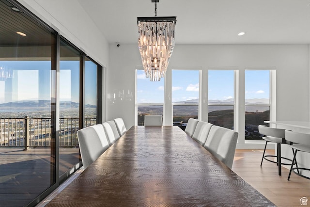 4473 N Solstice Dr, Lehi, UT 84043 - dining room featuring a mountain view, light wood-style flooring, a chandelier, and recessed lighting
