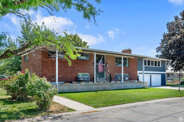 1775 S 290 E, Orem, UT 84058 - split foyer home with driveway, a chimney, a front lawn, entry steps, and brick siding