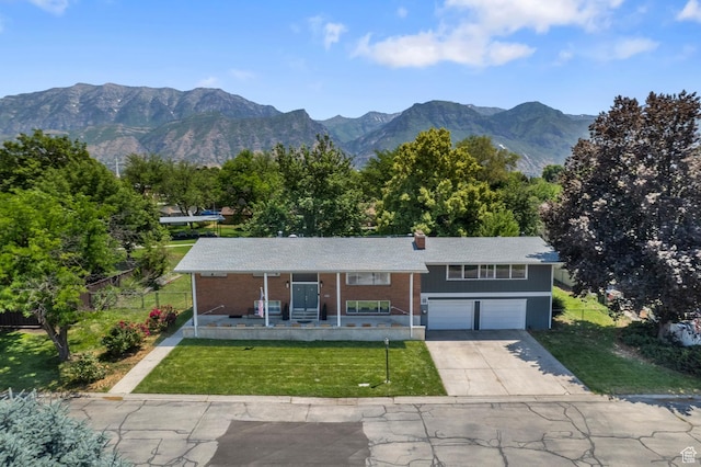 1775 S 290 E, Orem, UT 84058 - single story home with a garage, a porch, concrete driveway, a mountain view, and brick siding