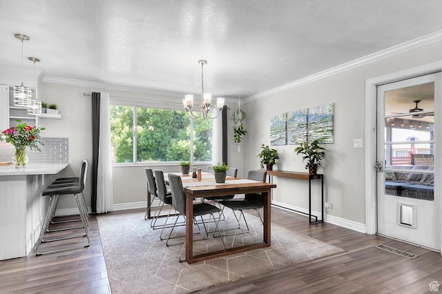1775 S 290 E, Orem, UT 84058 - dining area with a chandelier, wood finished floors, and ornamental molding