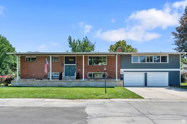 1775 S 290 E, Orem, UT 84058 - split foyer home with driveway, a garage, a front yard, and brick siding
