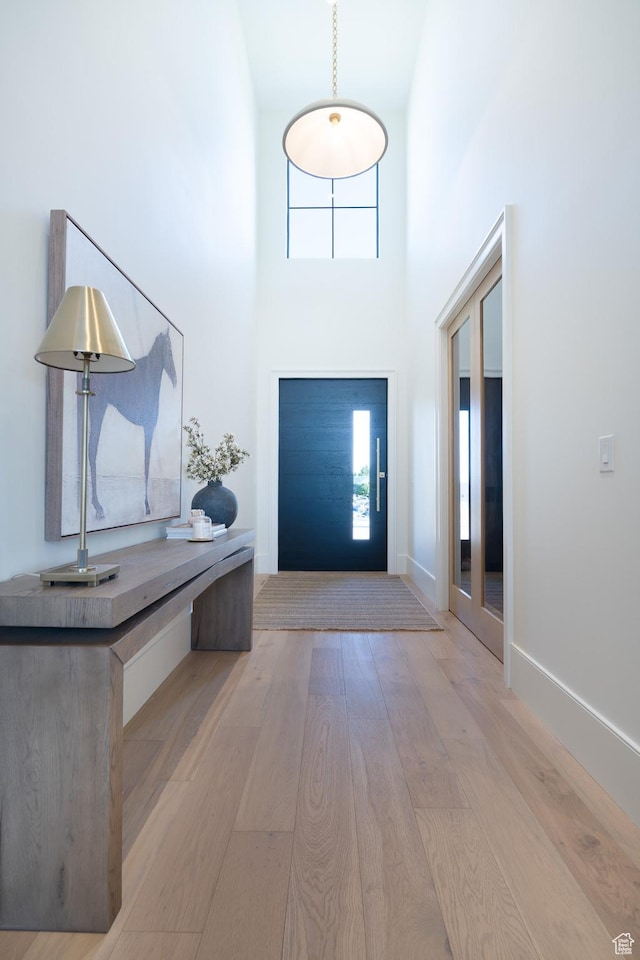 1889 W 1400 S, Lehi, UT 84043 - entryway featuring wood finished floors, healthy amount of natural light, and a towering ceiling