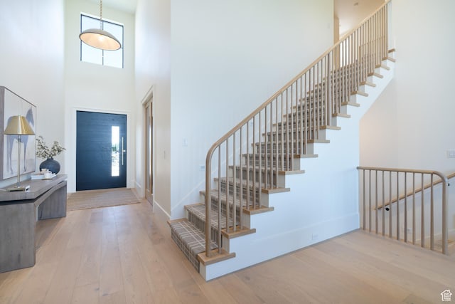 1889 W 1400 S, Lehi, UT 84043 - entryway with hardwood / wood-style flooring, a towering ceiling, and stairs