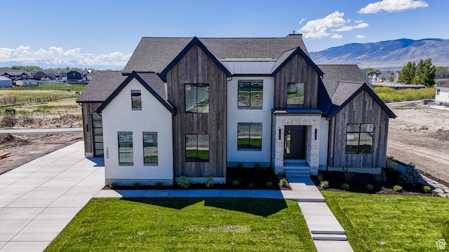 1889 W 1400 S, Lehi, UT 84043 - view of front of home featuring a front yard, a shingled roof, and a mountain view