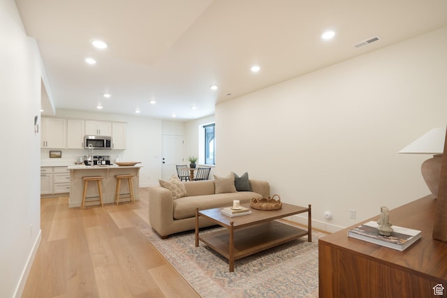 1889 W 1400 S, Lehi, UT 84043 - living room featuring light wood-style flooring and recessed lighting
