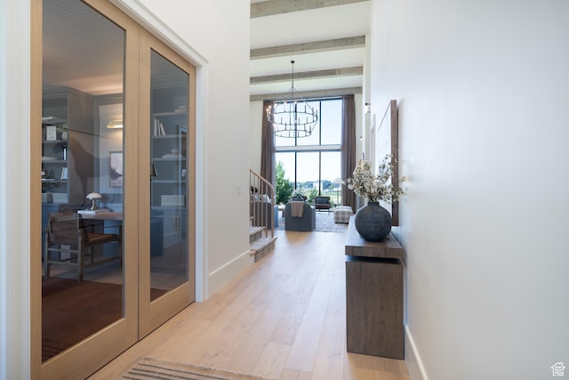 1889 W 1400 S, Lehi, UT 84043 - hall with a chandelier, light wood-style floors, beam ceiling, and stairs