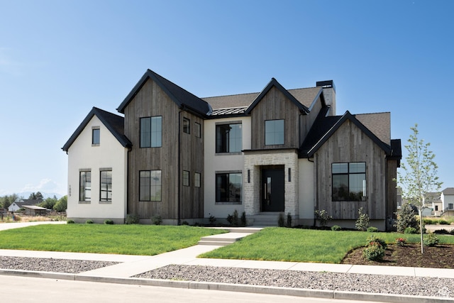 1889 W 1400 S, Lehi, UT 84043 - modern inspired farmhouse with a standing seam roof, a front yard, a metal roof, and a chimney