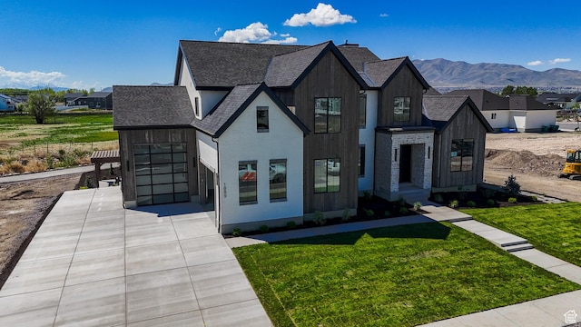 1889 W 1400 S, Lehi, UT 84043 - view of front facade featuring a front lawn, a shingled roof, and a mountain view
