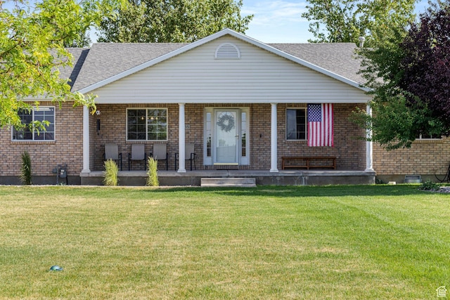 5335 W 5500 S, Hooper, UT 84315 - view of front of property featuring a porch, brick siding, and a front yard