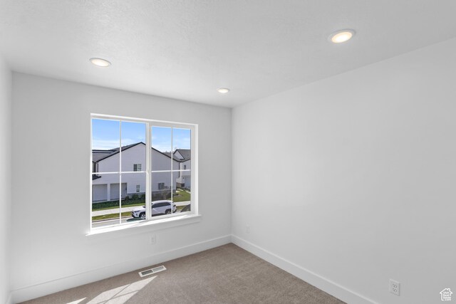 223 E 580 N, Providence, UT 84332 - carpeted empty room featuring recessed lighting