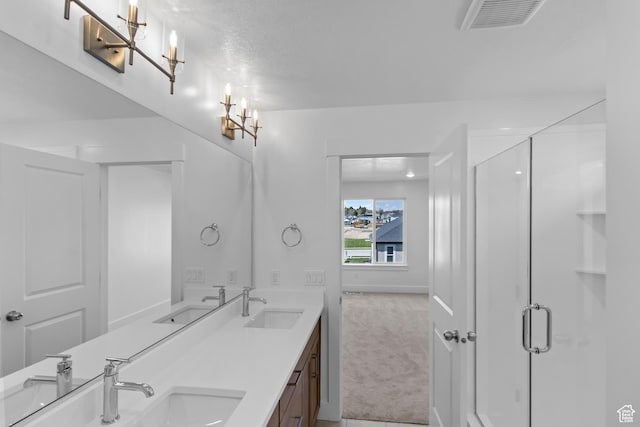 223 E 580 N, Providence, UT 84332 - bathroom with double vanity, a shower stall, and a chandelier