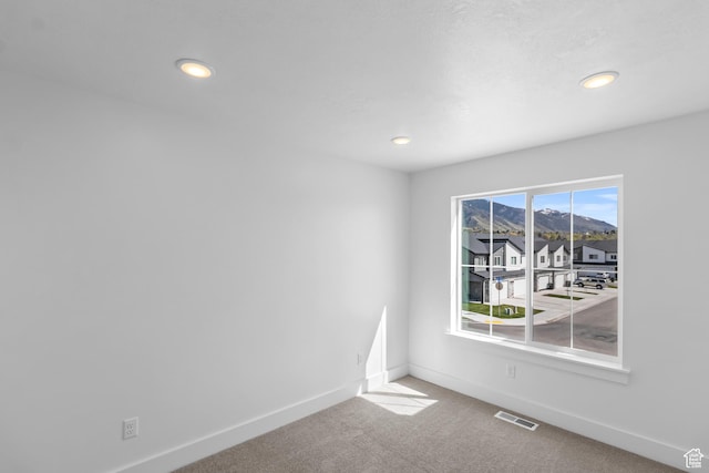 223 E 580 N, Providence, UT 84332 - carpeted spare room with baseboards and recessed lighting