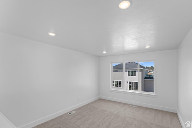223 E 580 N, Providence, UT 84332 - unfurnished room featuring light carpet and recessed lighting