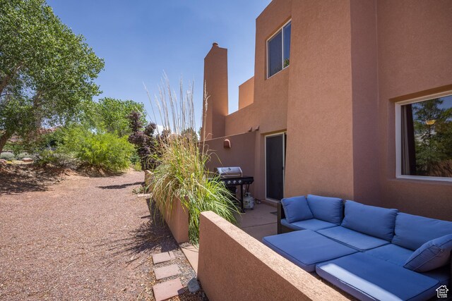 3287 E Fairway Loop, Moab, UT 84532 - view of patio featuring an outdoor living space and a grill