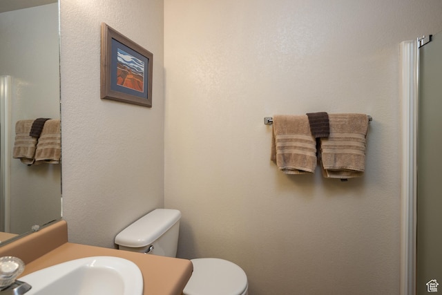 3287 E Fairway Loop, Moab, UT 84532 - bathroom featuring toilet and vanity