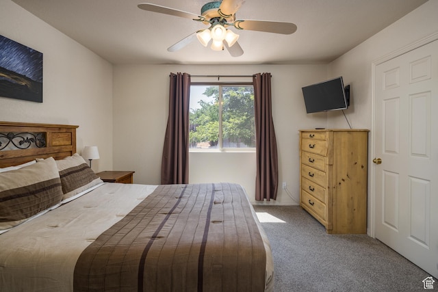 3287 E Fairway Loop, Moab, UT 84532 - carpeted bedroom featuring a ceiling fan