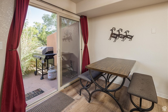 3287 E Fairway Loop, Moab, UT 84532 - dining room featuring wood finished floors and baseboards