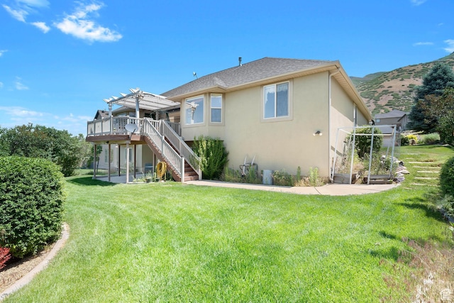 328 S 1060 E, Santaquin, UT 84655 - rear view of property with a pergola, stucco siding, stairs, a yard, and a deck with mountain view