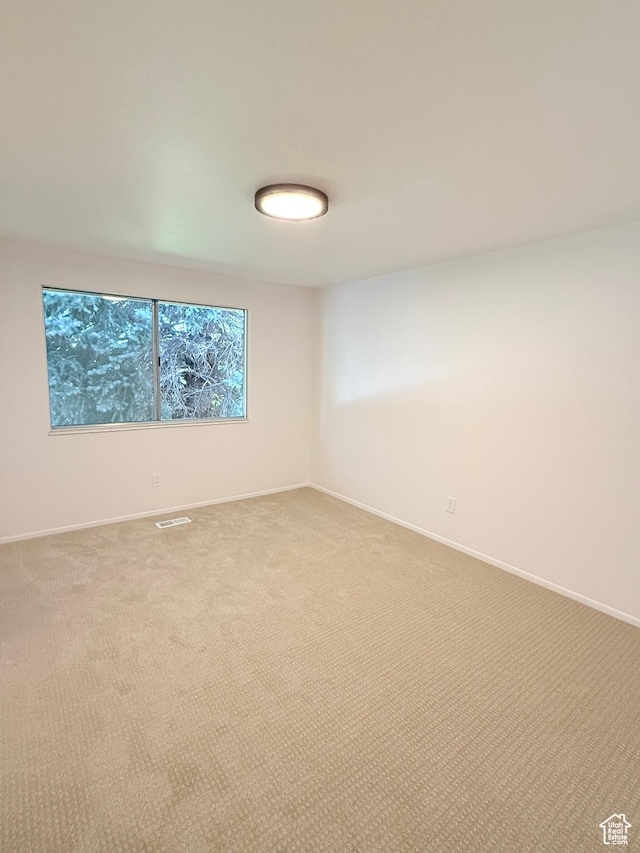 3841 W Bluebird Cir, West Valley City, UT 84120 - empty room with carpet and baseboards