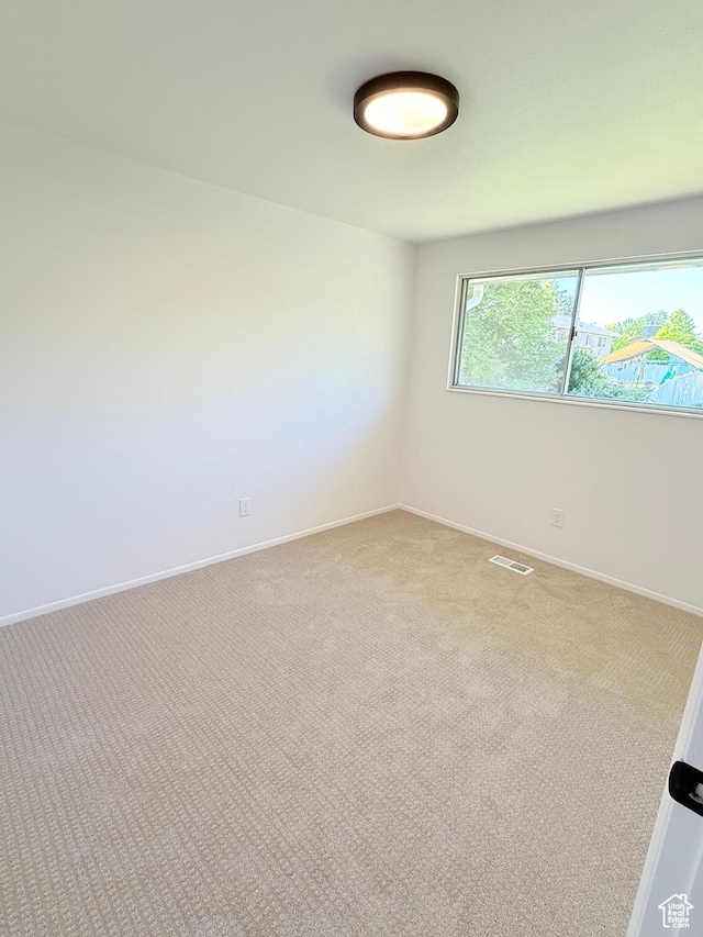 3841 W Bluebird Cir, West Valley City, UT 84120 - empty room with carpet flooring