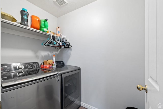 1021 Sara Ln, Ogden, UT 84404 - washroom with washing machine and clothes dryer and baseboards