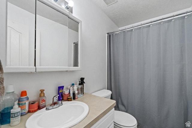 1021 Sara Ln, Ogden, UT 84404 - full bath featuring vanity, a textured ceiling, and a shower with shower curtain