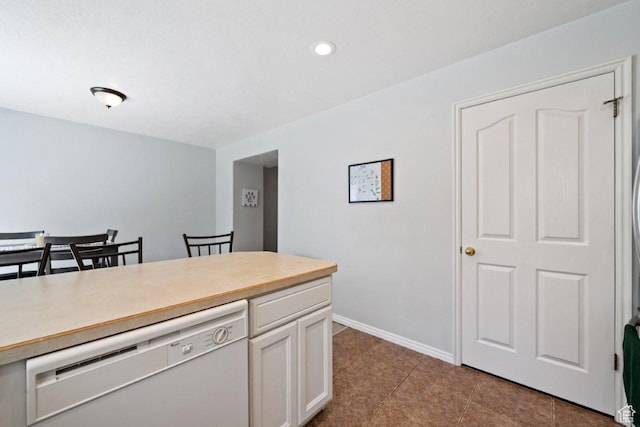 1021 Sara Ln, Ogden, UT 84404 - kitchen with dishwasher, white cabinetry, light countertops, recessed lighting, and tile patterned floors