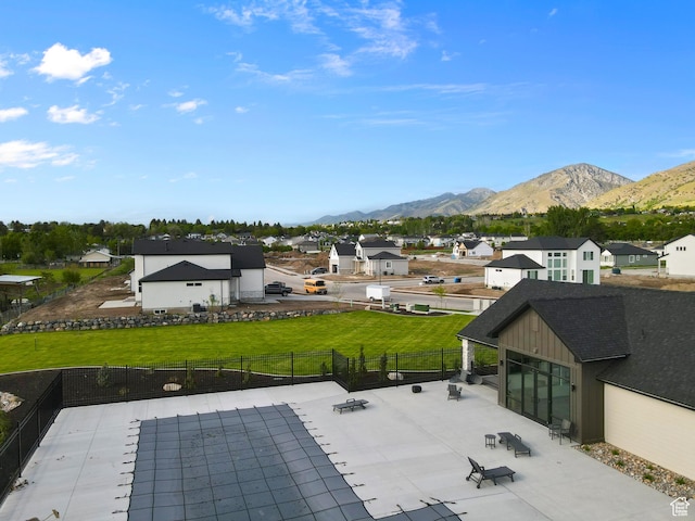 233 E 580 N, Providence, UT 84332 - view of swimming pool with a fenced backyard, a mountain view, a residential view, and a patio