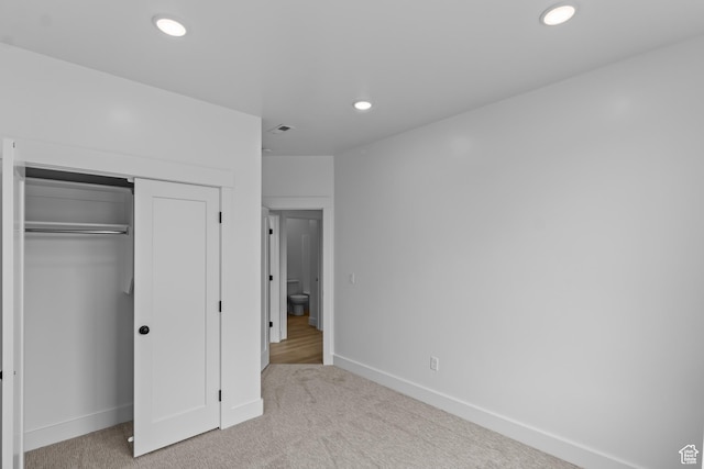 233 E 580 N, Providence, UT 84332 - unfurnished bedroom with carpet floors, a closet, and recessed lighting